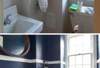 Making a Statement: Embracing Dark Hues in Your Petite Bathroom