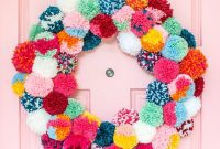 A Vibrant Boho Holiday Pom Pom Wreath