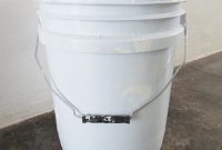 Repurposed Charm: Crafting a Unique Side Table from Paint Buckets
