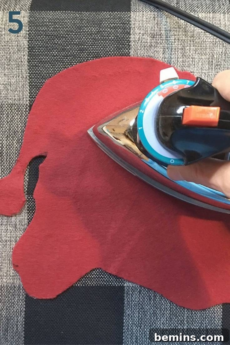 Cutting Out Felt Santa Silhouette