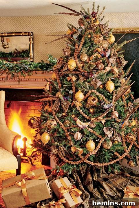 10 Visionary Christmas Tree Decorating Styles 4 Natural Christmas tree adorned with rustic feathers and warm chestnuts