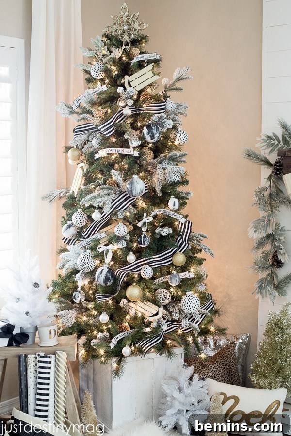10 Visionary Christmas Tree Decorating Styles 5 Modern black and white themed Christmas tree with elegant contrasting decorations