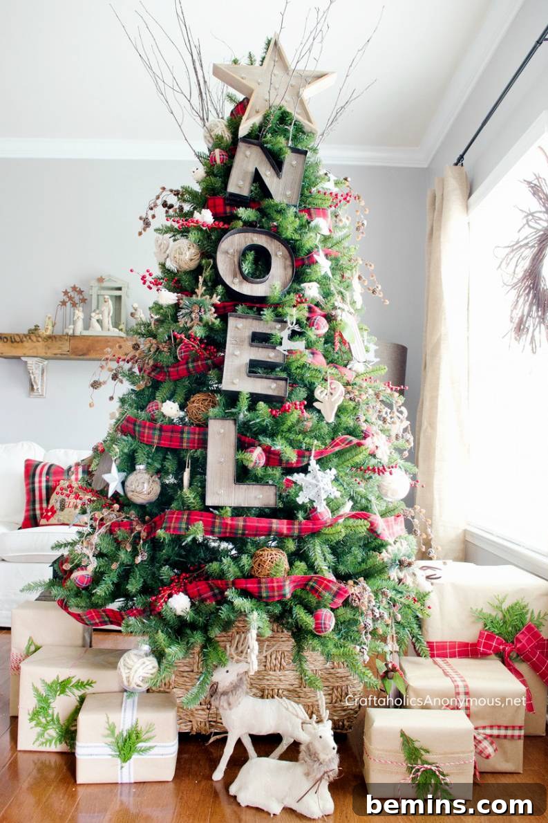 10 Visionary Christmas Tree Decorating Styles 8 Unique Christmas tree decorated with rustic typography ornaments spelling festive words