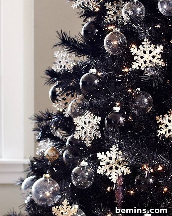 10 Visionary Christmas Tree Decorating Styles 9 Dramatic black Christmas tree adorned with bold and sophisticated decorations