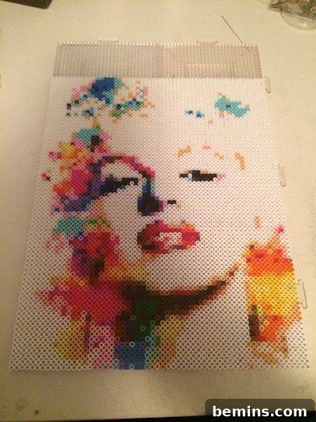 A striking portrait of Marilyn Monroe crafted entirely from Perler beads.