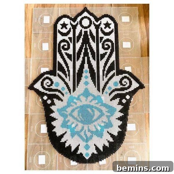 A beautifully crafted hand made from Perler beads, showcasing intricate detail and artistic expression.