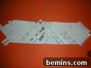 Paper Flips: DIY Footwear Fun 7 Complete woven strip of newspaper
