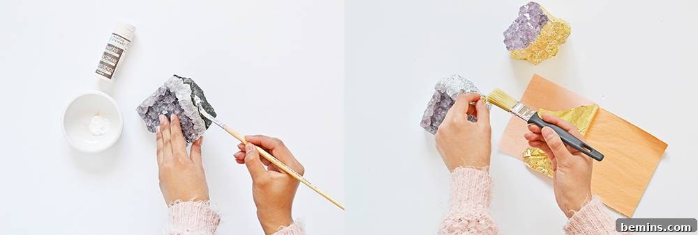 Applying tacky glue to amethyst crystal for gold leaf