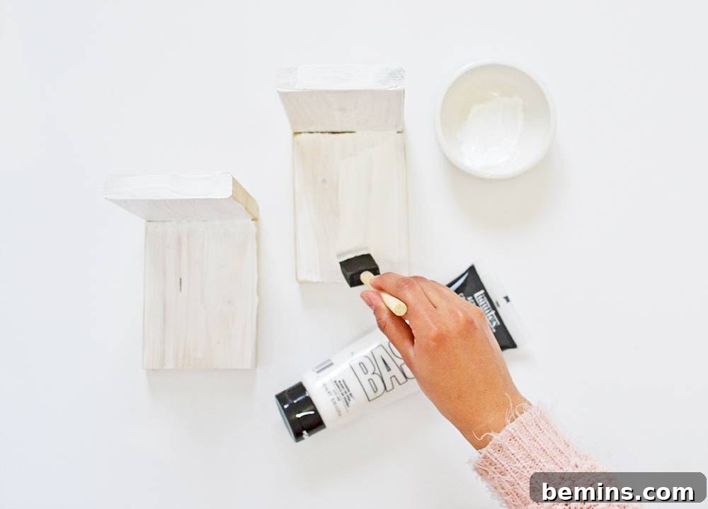 Painting wooden bookend bases with white acrylic paint
