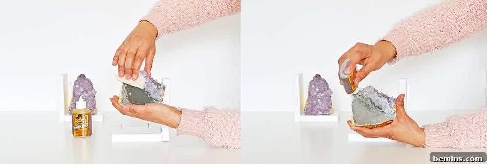 Applying glue to amethyst base before final attachment to wood