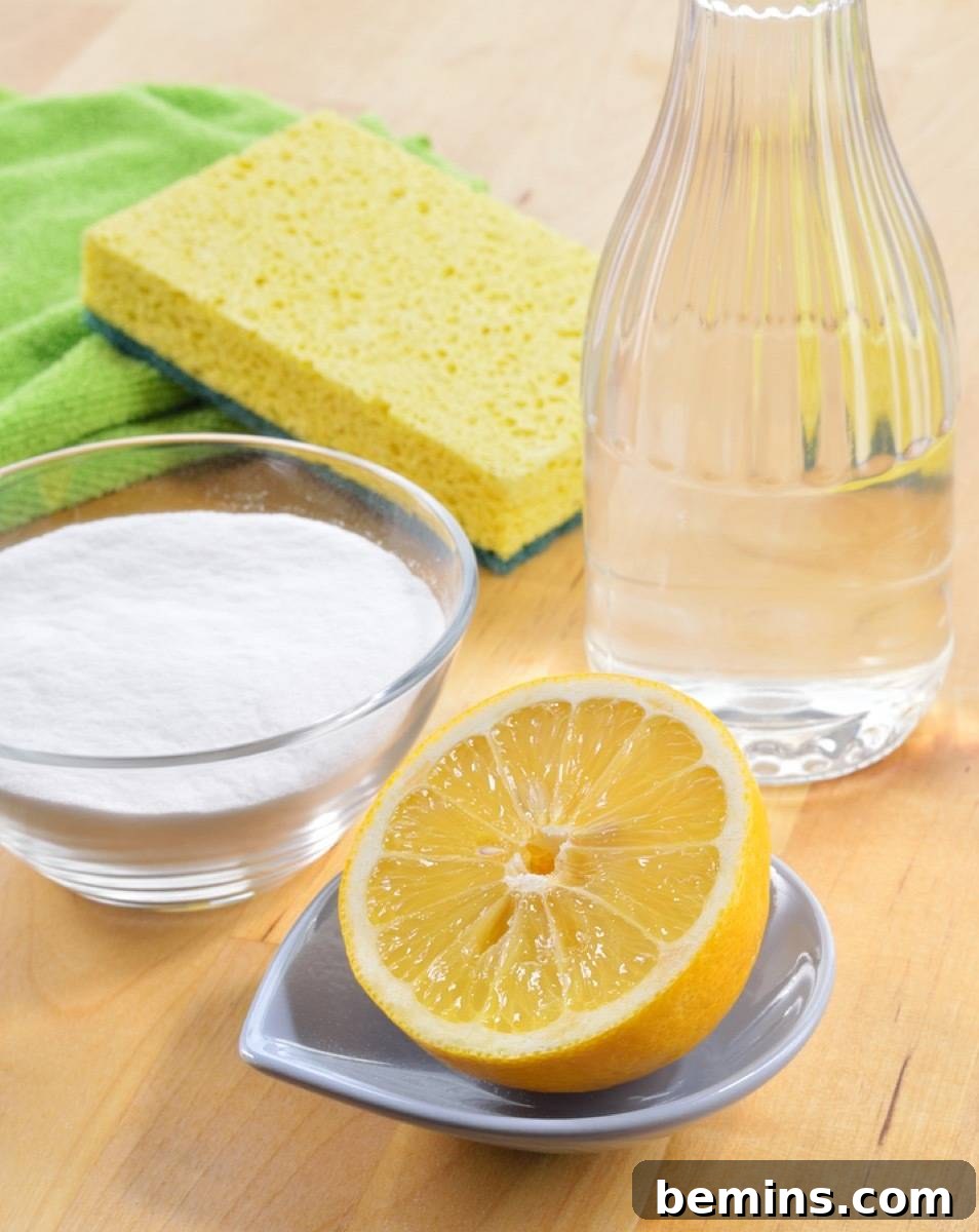 Home Scent Mastery Create an Amazing Atmosphere with Potpourri and Fragrance 11 DIY cleaning solution with lemon, vinegar, and baking soda for odor removal