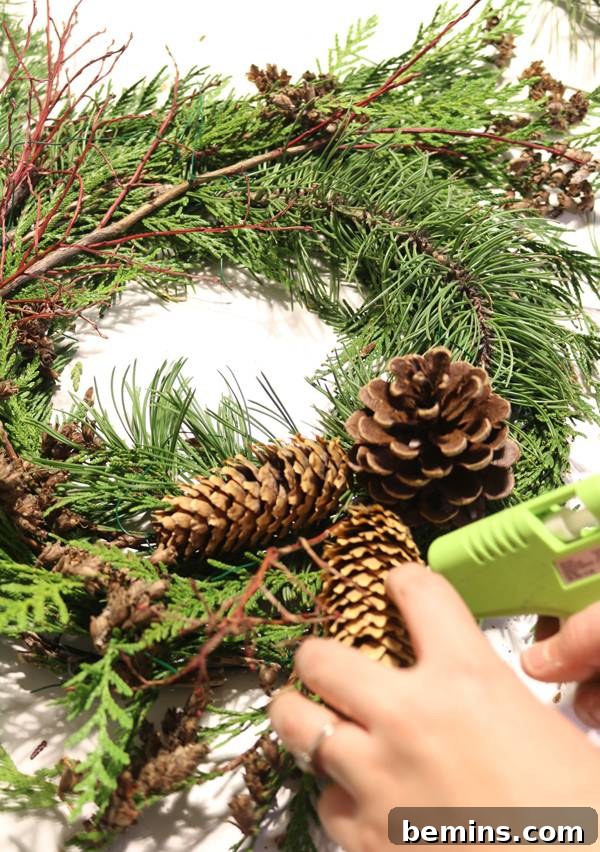 Adding Branches and Berries to the Wreath