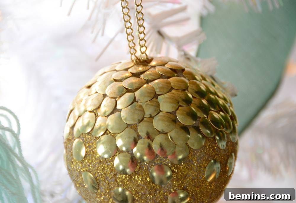 Gold Thumb Tack Ornament on Christmas Tree