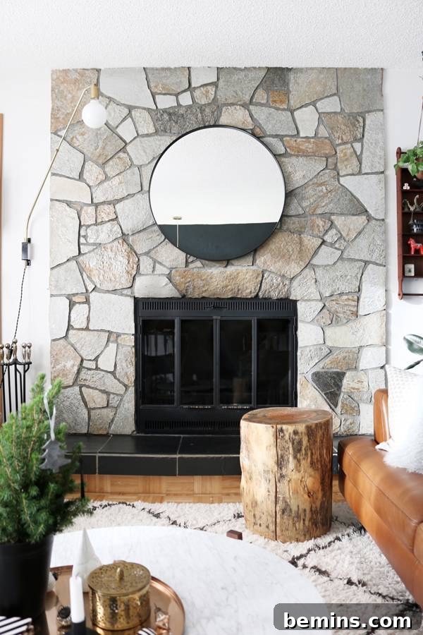 Clearing the space around the fireplace to prepare for decorating.