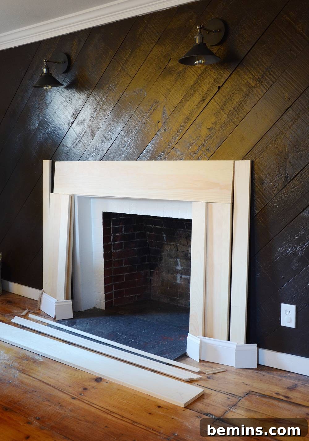 Crafting Your Own Fireplace Mantel 6 Lumber pieces for DIY mantel layout against a wall