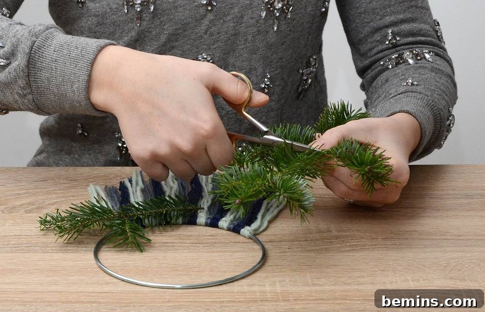 Attaching Evergreen Branches to the Wreath