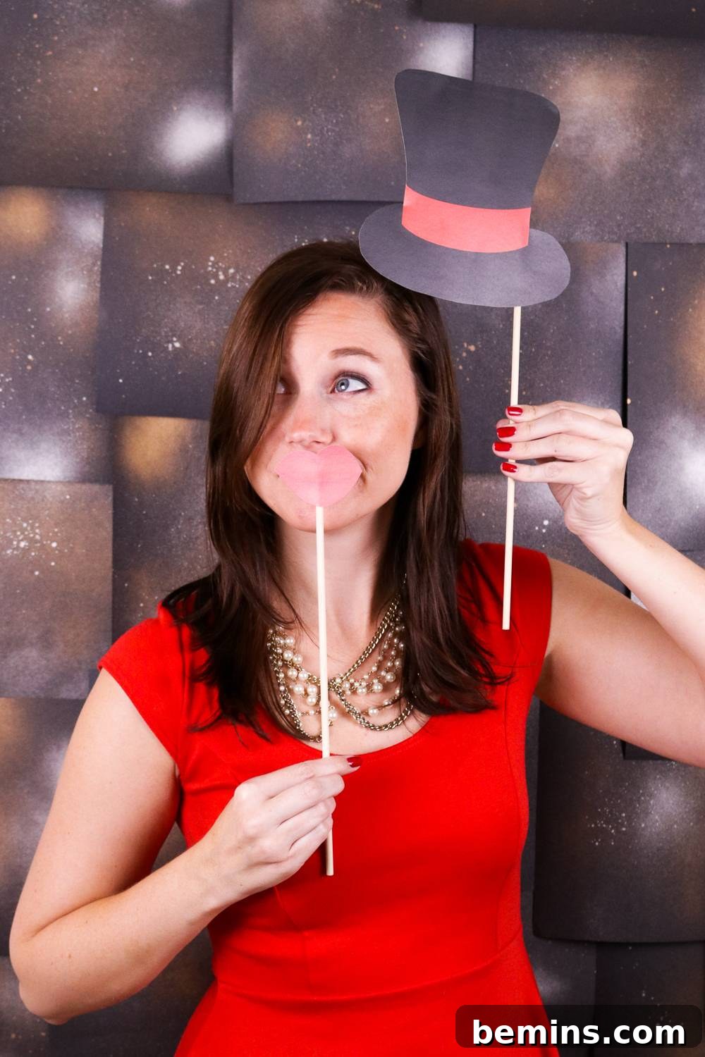 Attaching Wooden Dowels to New Year's Eve Photo Booth Props