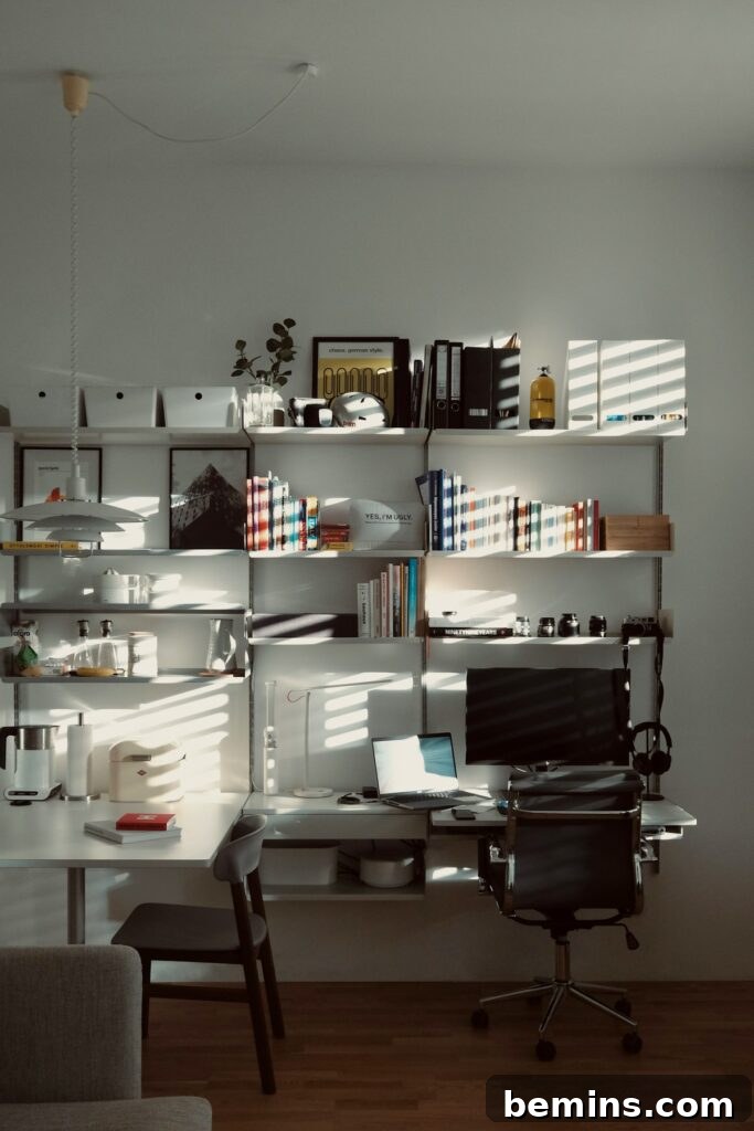 Workspace Bliss: Desk Organization Secrets 6 A desk with a laptop, a notebook, and a few personal touches, demonstrating a personalized and functional workspace.