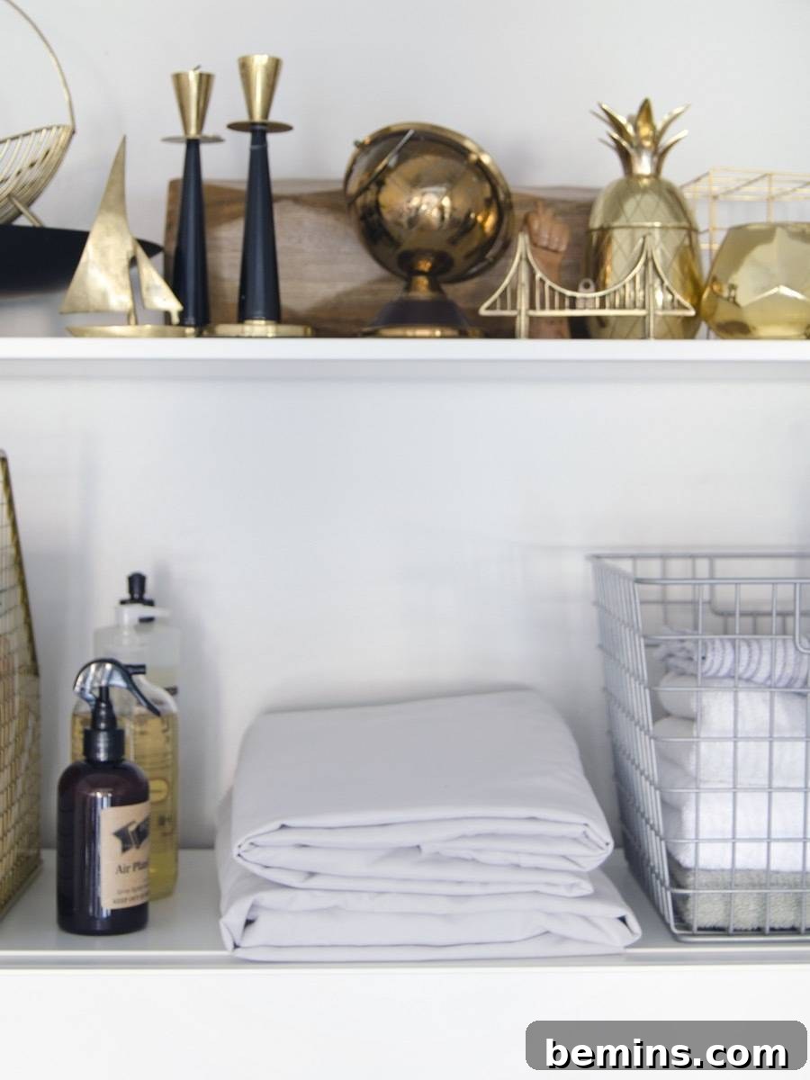 Learn the right way to fold a fitted sheet - no more balling it up and throwing it in the back of the closet!