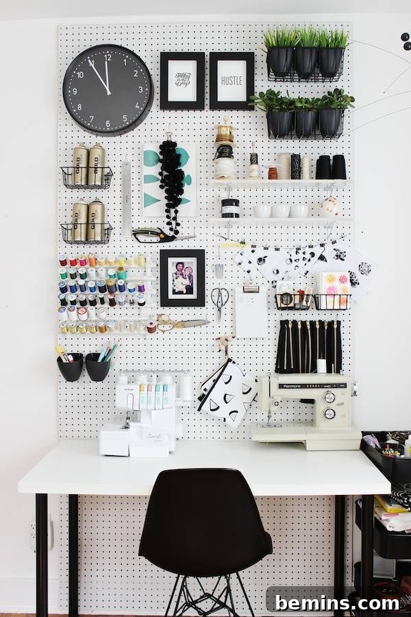 30 Impeccably Organized Studios for Creative Genius 10 Creative workspace with an updated pegboard system and organized supplies.
