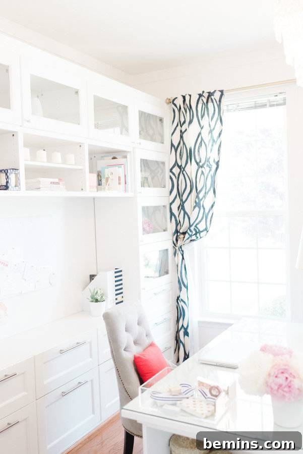 30 Impeccably Organized Studios for Creative Genius 25 Home office with elegant white built-in cabinetry.