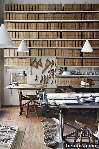 30 Impeccably Organized Studios for Creative Genius 30 Studio with neutral brown and wood tones, creating a calm atmosphere.