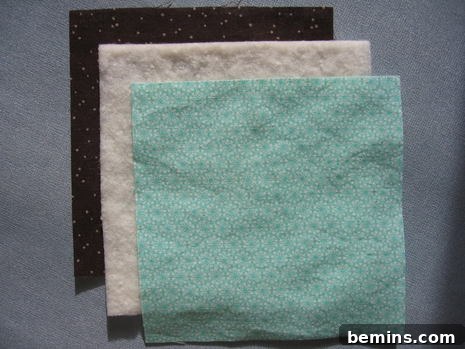 Cut fabric and batting pieces for the coaster base.