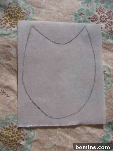 Draw or trace your applique design onto the fusible web liner.