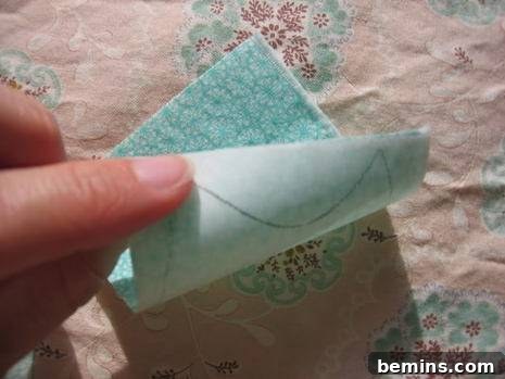 Attach the fusible web to the wrong side of the applique fabric.