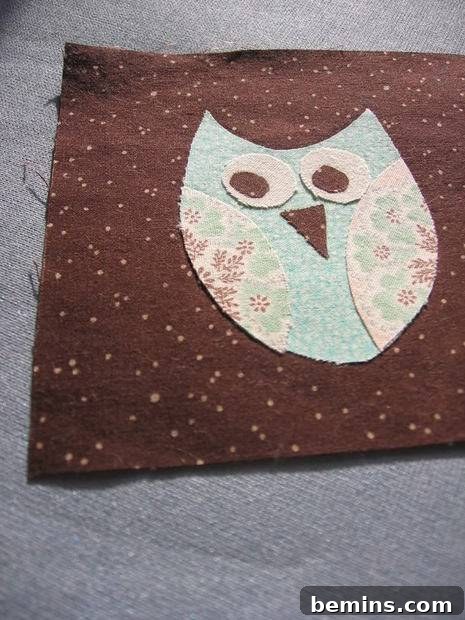 Completed applique design on the coaster fabric.