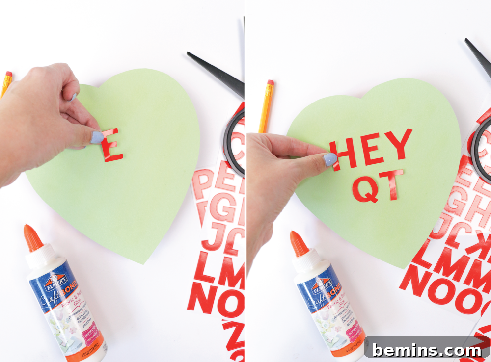 Gluing the paper hearts to the chocolate box