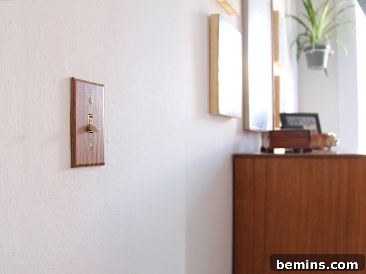 Apartment Bliss: DIY Upgrades Your Landlord Will Love 8 Landlord-friendly apartment upgrades: Decorate outlet and light switch covers using contact paper