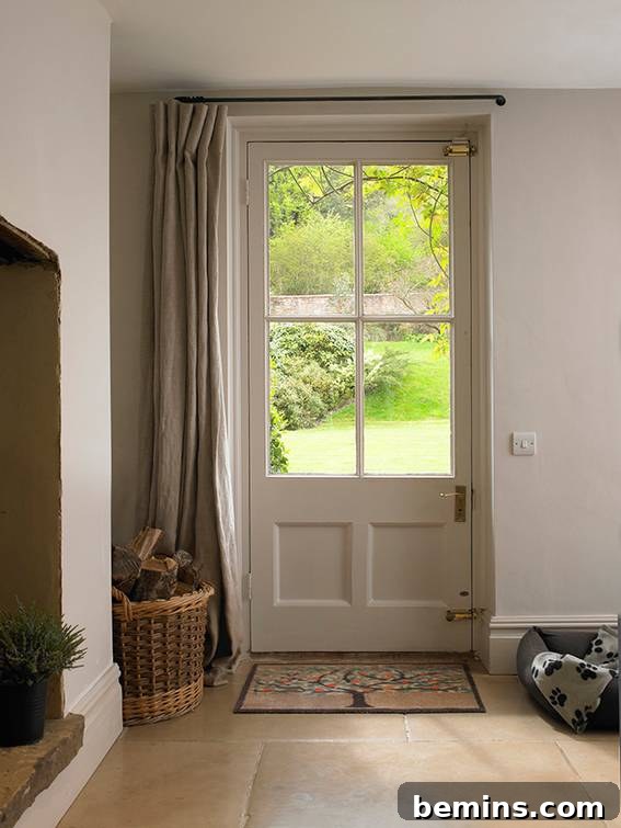 20 Ways to Cozy Up Your Home This Winter 5 Add insulation by hanging curtains over your front door