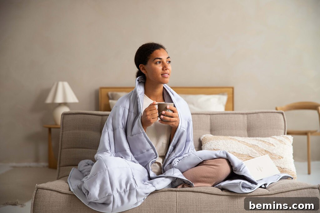 20 Ways to Cozy Up Your Home This Winter 3 Woman Enjoying Tea in a Cozy Blanket