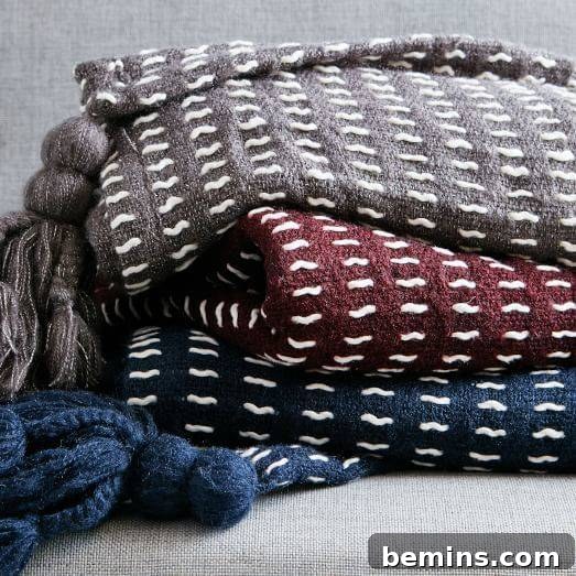 Irresistibly Cozy: 20 Scandinavian Pillows and Throws to Transform Your Home 14 Dash Stitch Throw