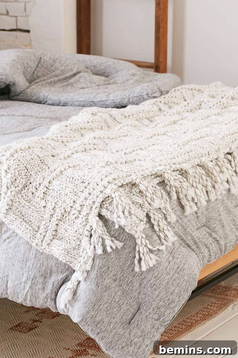 Irresistibly Cozy: 20 Scandinavian Pillows and Throws to Transform Your Home 22 Seed Stitch Knit Throw Blanket