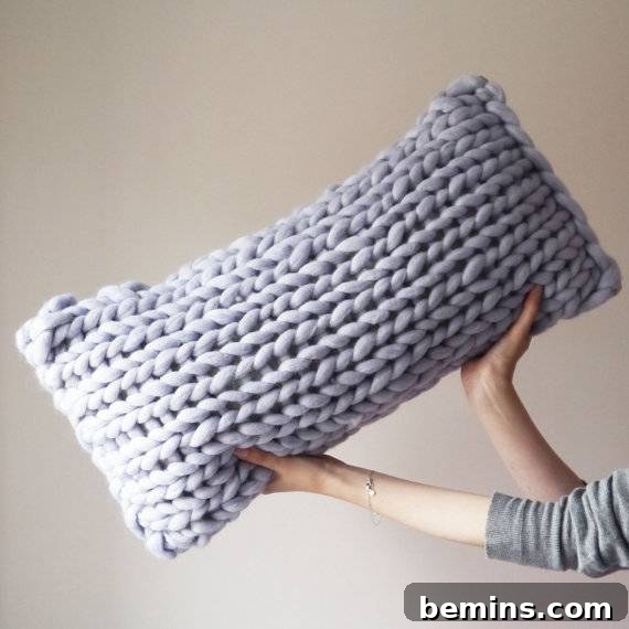 Irresistibly Cozy: 20 Scandinavian Pillows and Throws to Transform Your Home 5 Oblong Chunky Knit Cushion