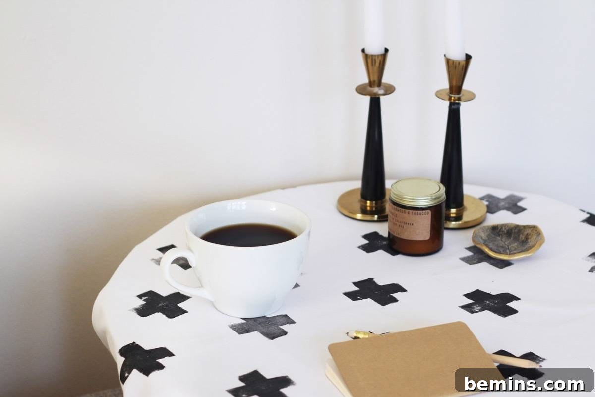 Make This: Stamped Tablecloth in Swiss cross pattern