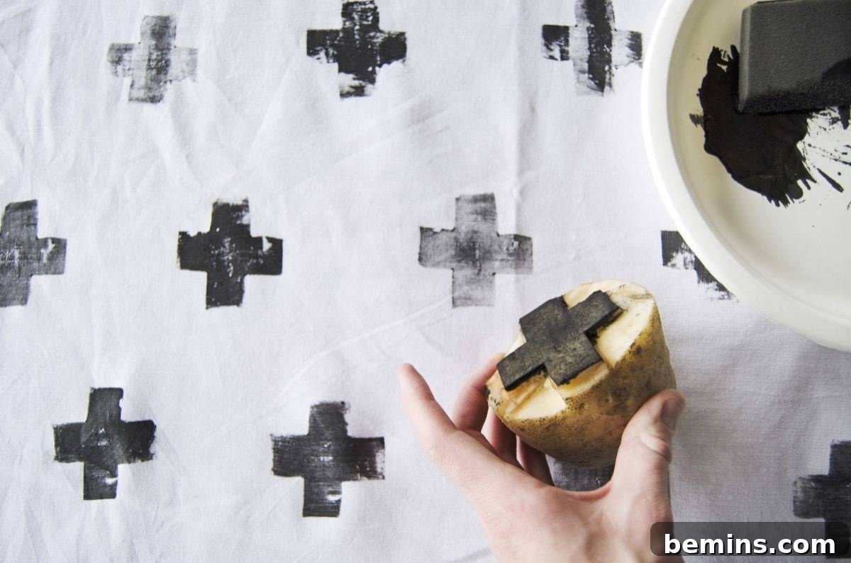 How to make a Scandinavian-inspired tablecloth: Use acrylic paint to stamp