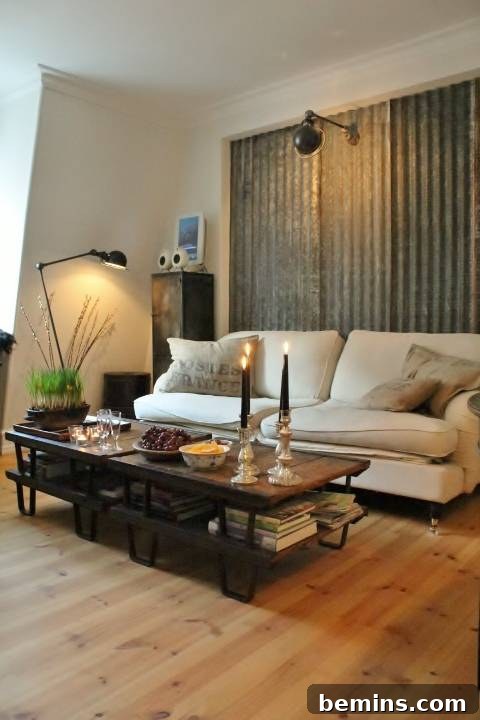 A corrugated metal accent wall adds an industrial edge to a living room.