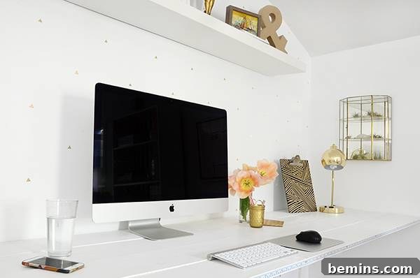 Metallic tape creates a sophisticated and eye-catching accent wall.