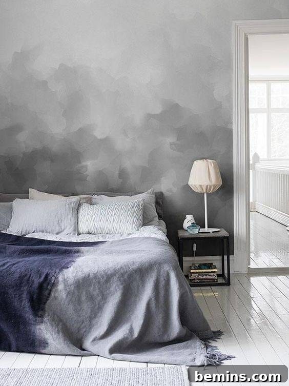 A textured ombre mural adds depth and sophistication to a bedroom.