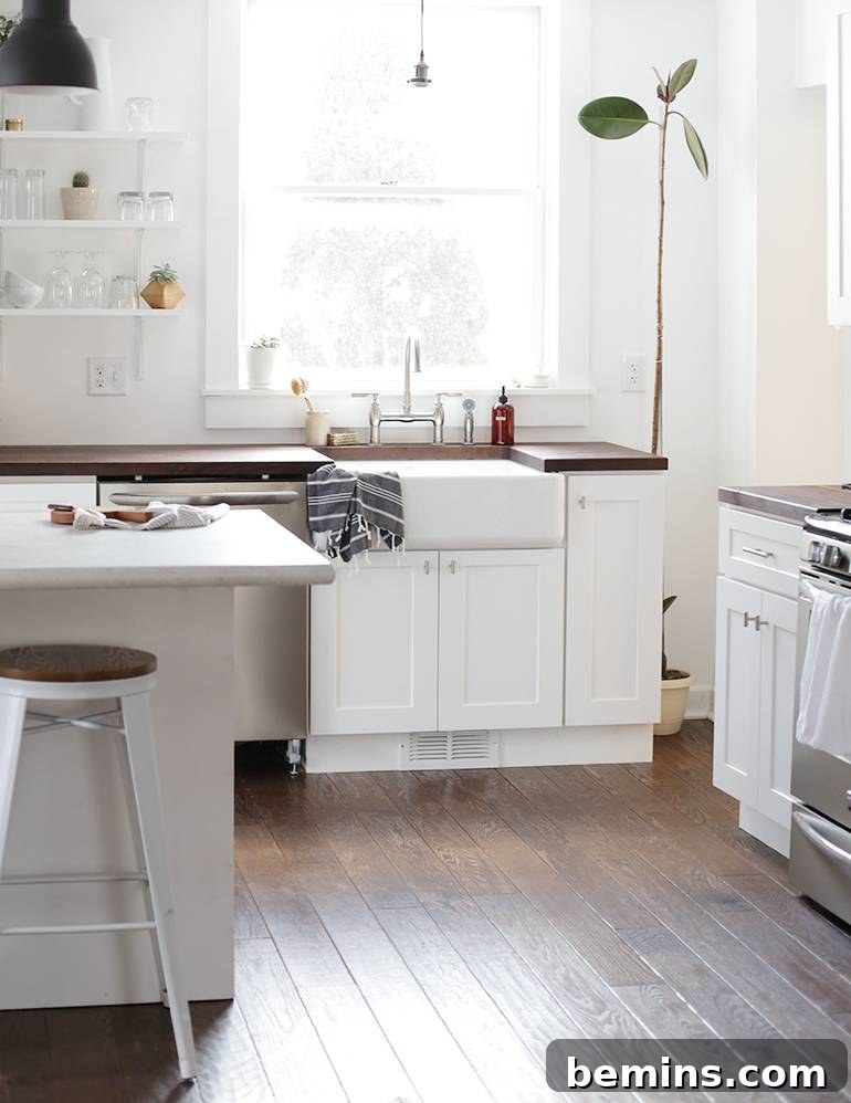 Scandinavian Kitchen: White Cabinets with Wooden Countertops