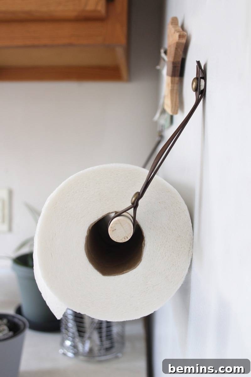 Hang your paper towels from the fridge to save kitchen space!