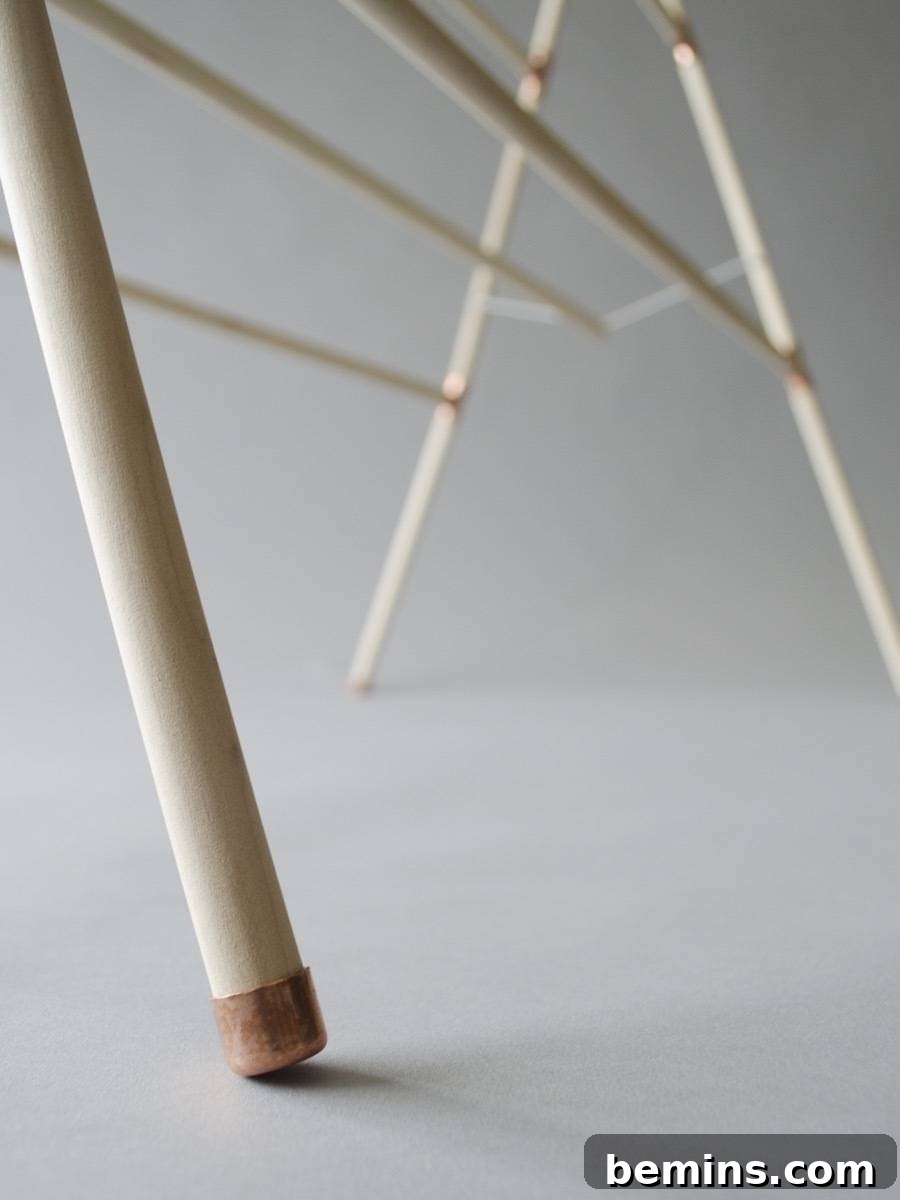 Make this: Copper and wood clothes drying rack