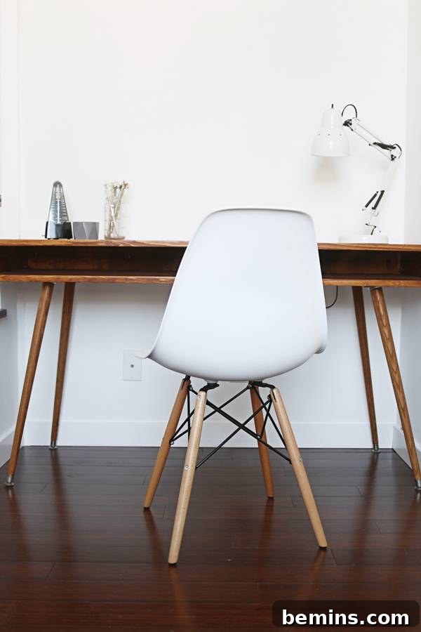 The shared home office space, designed for efficient and creative work, with both desks visible.