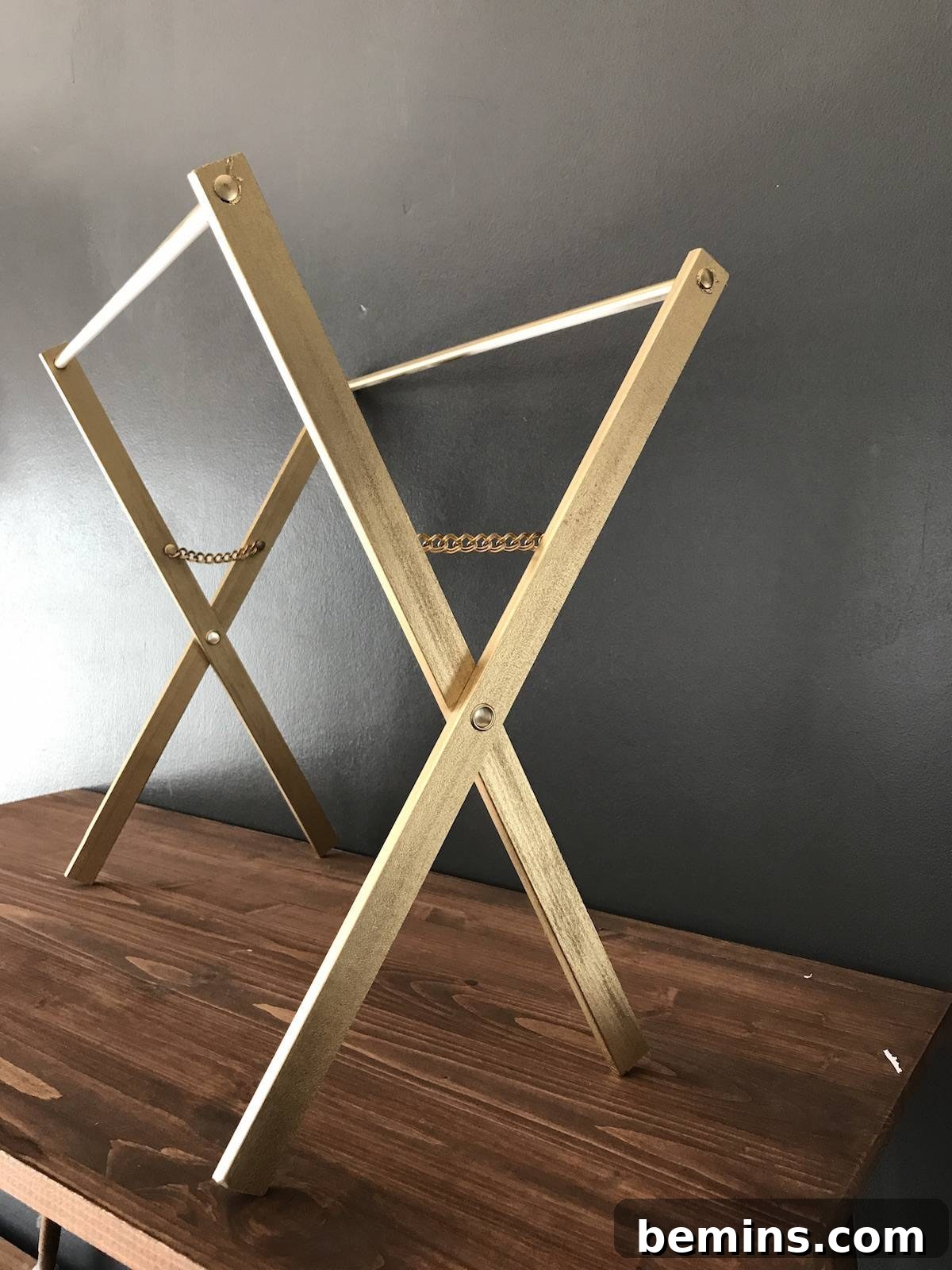 From Laundry to Literature: Upcycling Your Drying Rack into a Chic Magazine Holder 19 Spray Painting the Magazine Rack