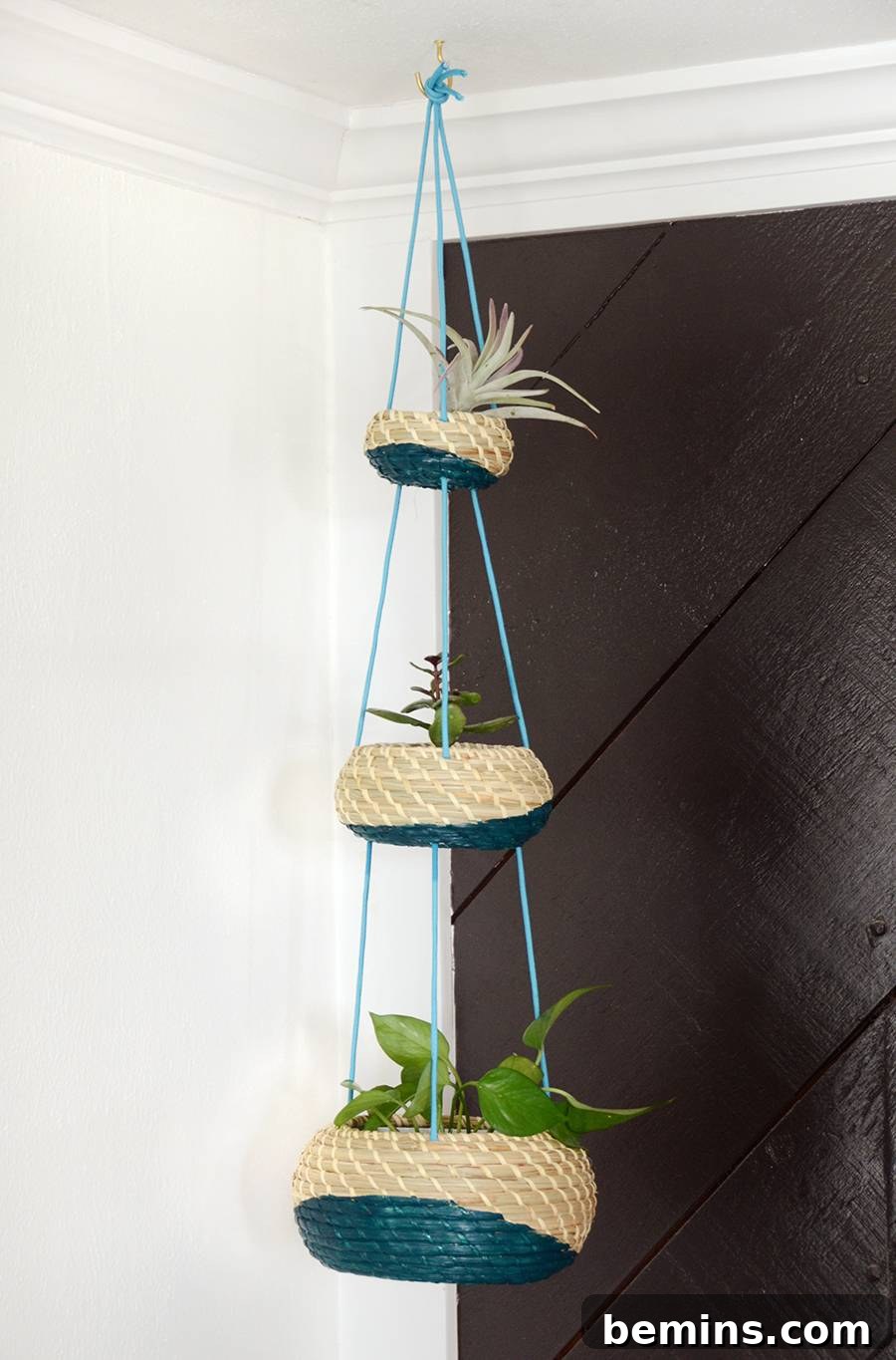 Knotting the cords to create the hanging loop