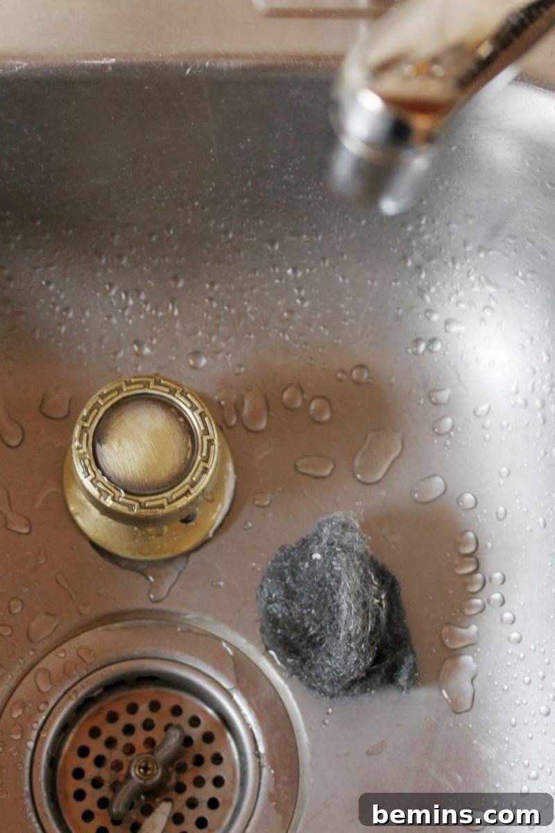 Removing paint from door hardware: Use steel wool