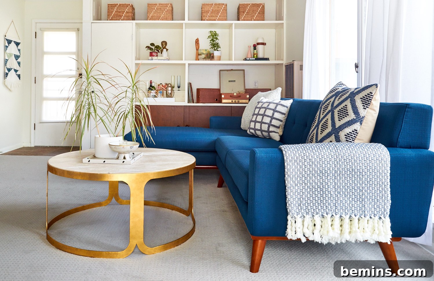 Curbly living room reveal with Shaw LifeHappens carpet. A bright, inviting space.